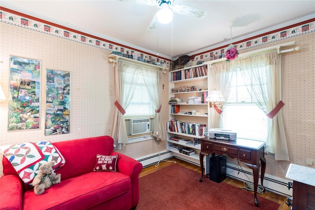 44 Jackson St, Fishkill, NY 12524 - interior space featuring a healthy amount of sunlight, baseboard heating, wallpapered walls, and wood finished floors