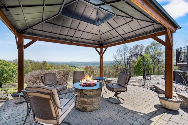 view of patio / terrace with a gazebo and an outdoor fire pit