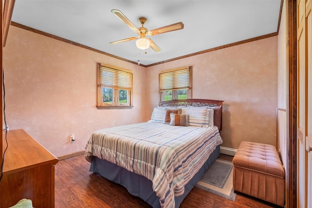 bedroom with baseboards, ornamental molding, and wood finished floors