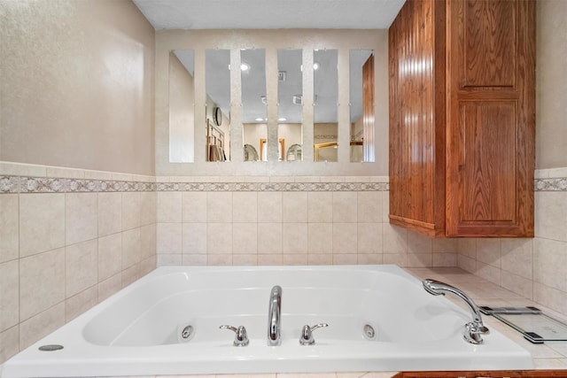 full bathroom featuring a jetted tub and tile walls