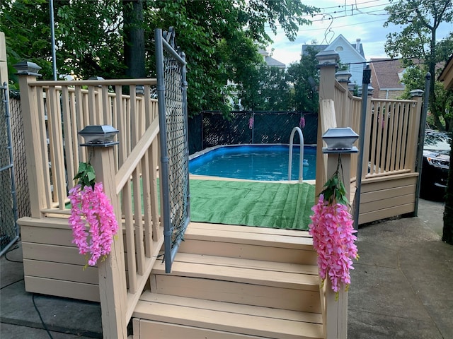 view of pool featuring fence and a fenced in pool