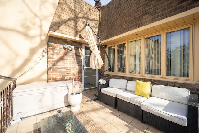 wooden deck featuring an outdoor living space and a patio area