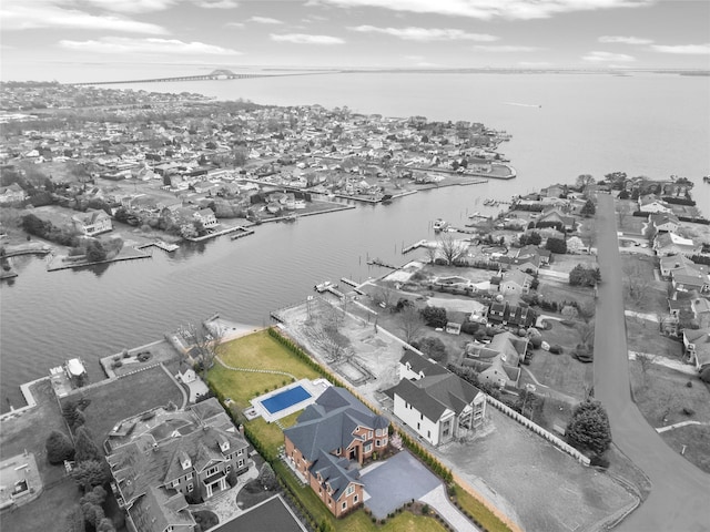aerial view with a water view and a residential view