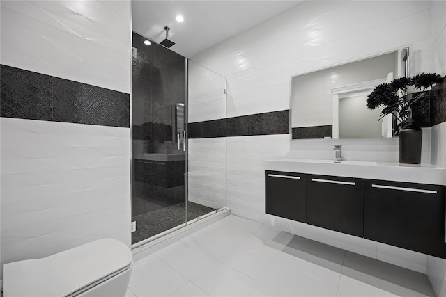 bathroom featuring tile walls, a stall shower, vanity, toilet, and recessed lighting