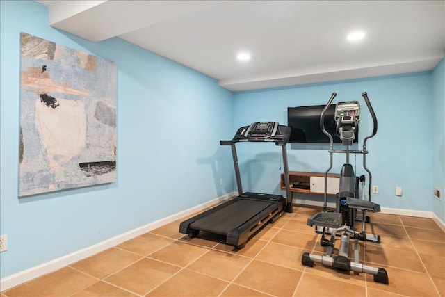 workout room featuring recessed lighting, tile patterned floors, and baseboards