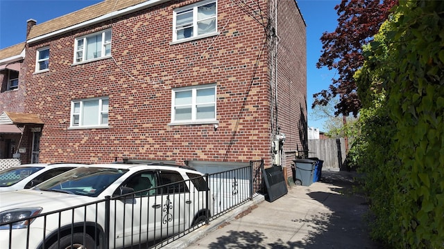 view of home's exterior featuring brick siding