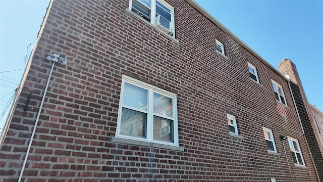 view of home's exterior featuring brick siding