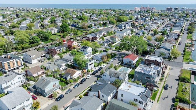 64 Harmon St, Long Beach, NY 11561 - aerial view of property's location with nearby suburban area and a nearby body of water