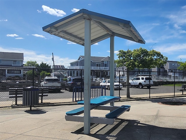 64 Harmon St, Long Beach, NY 11561 - surrounding community featuring uncovered parking and a residential view