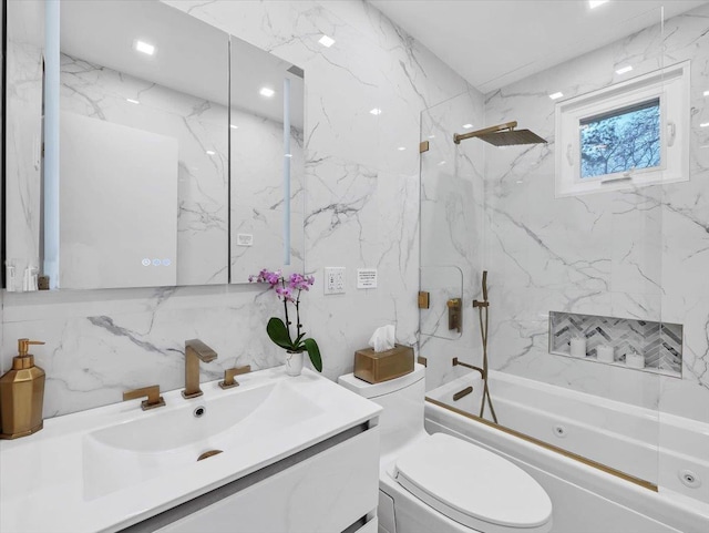 full bath featuring shower / bath combination, tile walls, tasteful backsplash, vanity, and toilet