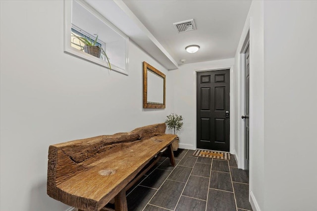 interior space featuring visible vents and baseboards
