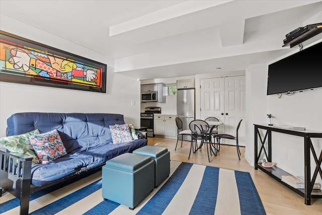 living area with light wood-style floors