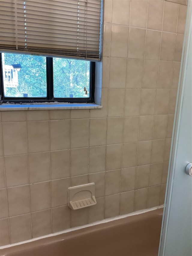 full bathroom featuring a shower and a tub