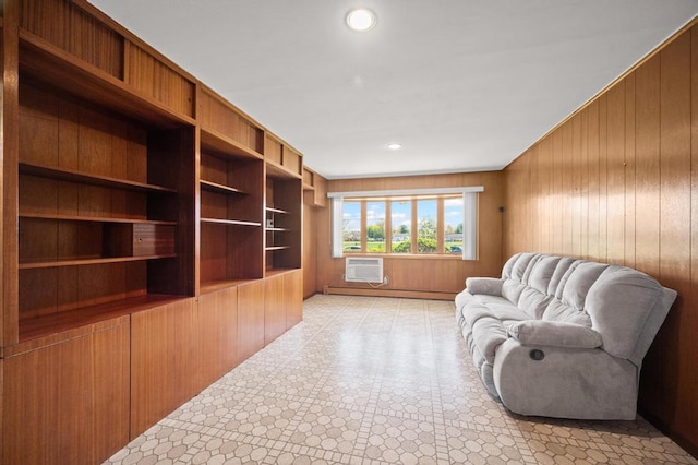 living area featuring recessed lighting, light floors, a wall mounted AC, and wooden walls
