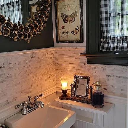 room details featuring a sink and decorative backsplash