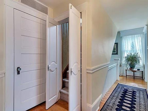 hallway featuring light wood finished floors