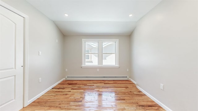 13108 160th St, Jamaica, NY 11434 - unfurnished room with a baseboard heating unit, light wood-style floors, baseboards, and recessed lighting