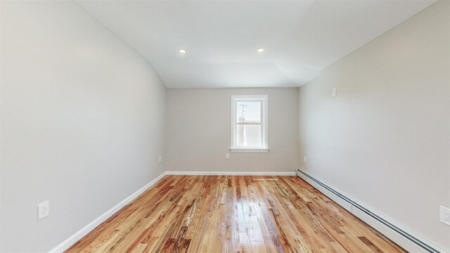 13108 160th St, Jamaica, NY 11434 - empty room with a baseboard radiator, light wood finished floors, baseboards, and recessed lighting
