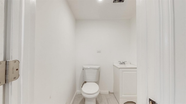 13108 160th St, Jamaica, NY 11434 - half bathroom with toilet, a sink, and baseboards