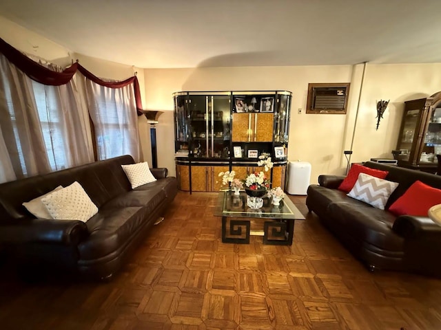 living room with an AC wall unit