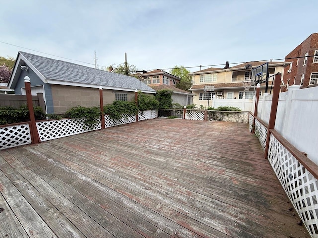 wooden deck with a residential view
