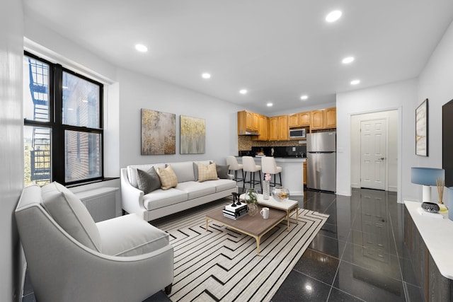 7002 Ridge Blvd Unit E14, Brooklyn, NY 11209 - living room with recessed lighting, baseboards, and granite finish floor