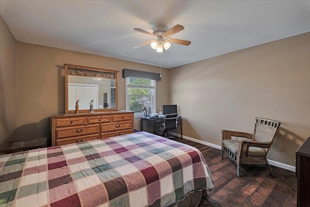 bedroom with baseboards, a ceiling fan, and dark wood finished floors