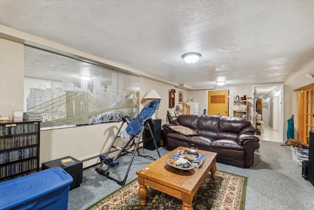 living room with carpet floors and a textured ceiling