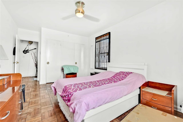 bedroom featuring a closet and ceiling fan