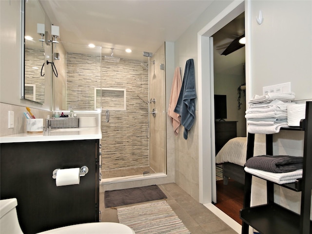 256 Macy Rd, Briarcliff Manor, NY 10510 - full bath featuring vanity, tile patterned flooring, a shower stall, and toilet