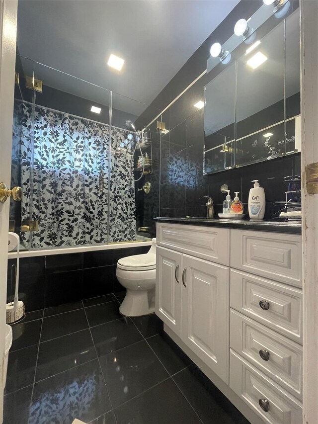 79 Constellation Rd, Levittown, NY 11756 - full bathroom featuring tiled shower / bath combo, tile patterned flooring, and vanity