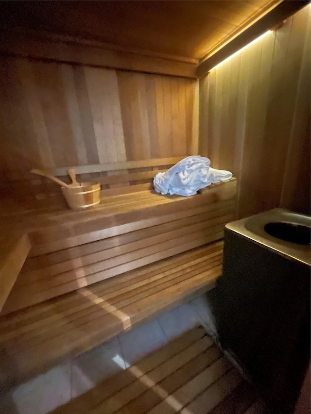 79 Constellation Rd, Levittown, NY 11756 - sauna with tile patterned floors and wood walls