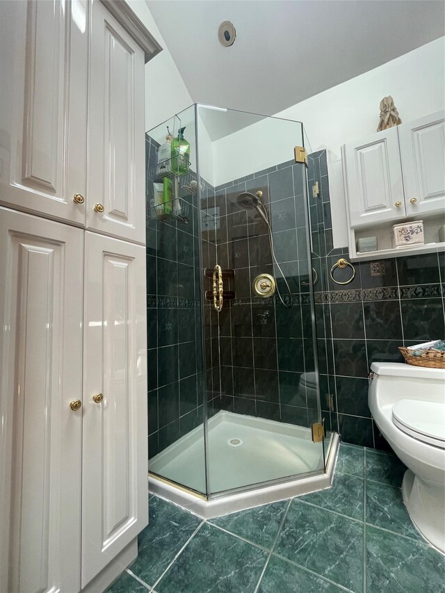 79 Constellation Rd, Levittown, NY 11756 - bathroom with a shower stall and tile walls