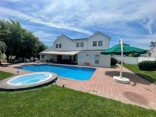 79 Constellation Rd, Levittown, NY 11756 - view of swimming pool featuring a patio area and an in-ground hot tub