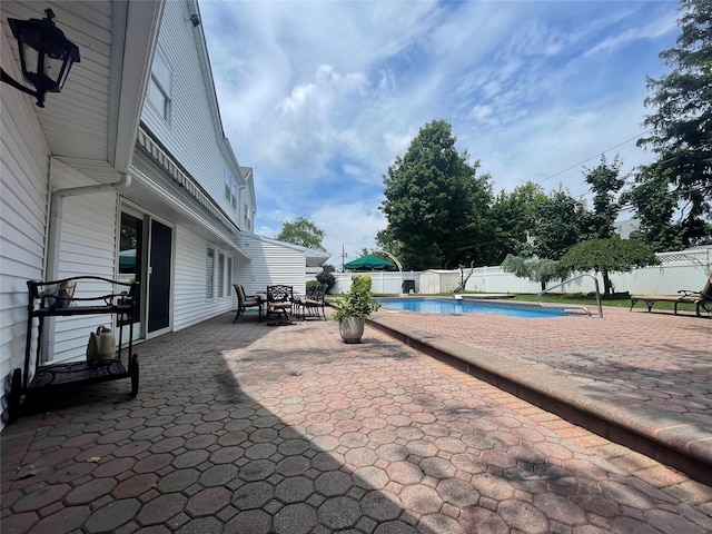 79 Constellation Rd, Levittown, NY 11756 - fenced backyard with a patio