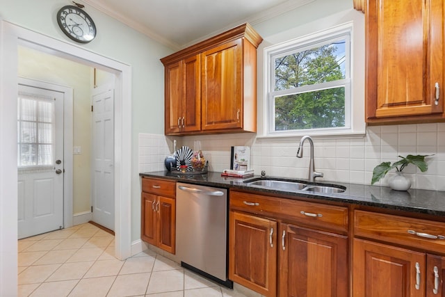 kitchen featuring stainless steel dishwasher, brown cabinetry, crown molding, a sink, and backsplash