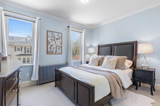 bedroom featuring baseboards, light colored carpet, ornamental molding, and radiator heating unit