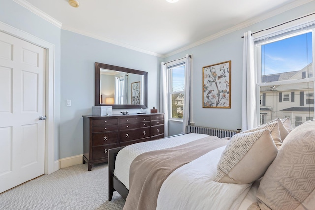 bedroom with light colored carpet, ornamental molding, baseboards, and radiator heating unit