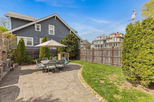 view of patio / terrace with a fenced backyard and outdoor dining space