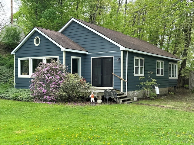 18 Anderson Rd, Clinton Corners, NY 12514 - rear view of house with a lawn and roof with shingles