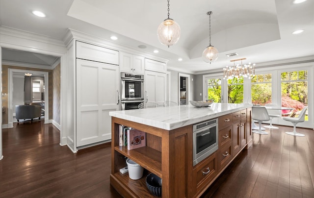 kitchen featuring open shelves, a center island, white cabinetry, lofted ceiling, and dark wood-type flooring
