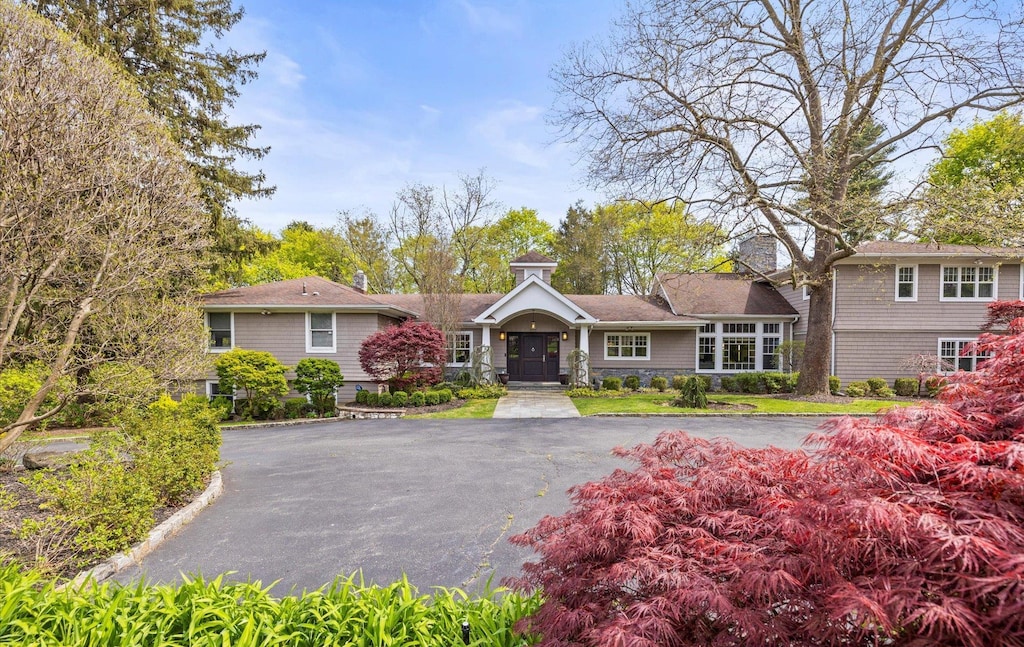 3 Tappentown Ln, Brookville, NY 11545 - view of front of property with aphalt driveway