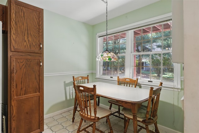 21 Lamplight St, Beacon, NY 12508 - dining area with baseboards, a healthy amount of sunlight, and light floors