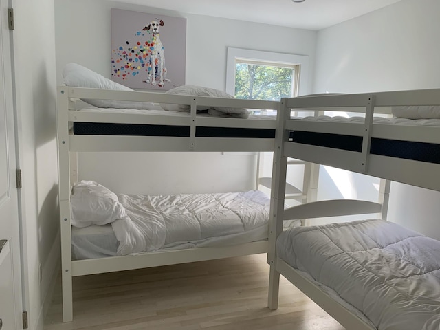 bedroom with wood finished floors