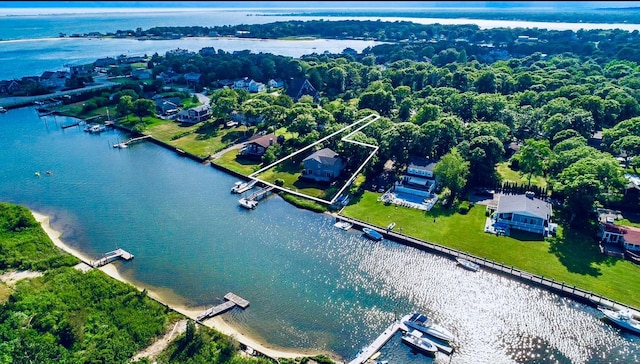 birds eye view of property featuring a water view
