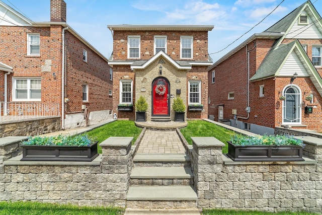 view of front facade with brick siding