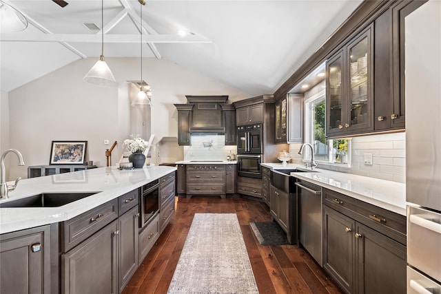 2307 Hawthorne Dr, Yorktown Heights, NY 10598 - kitchen featuring a sink, appliances with stainless steel finishes, dark wood-style floors, and glass insert cabinets