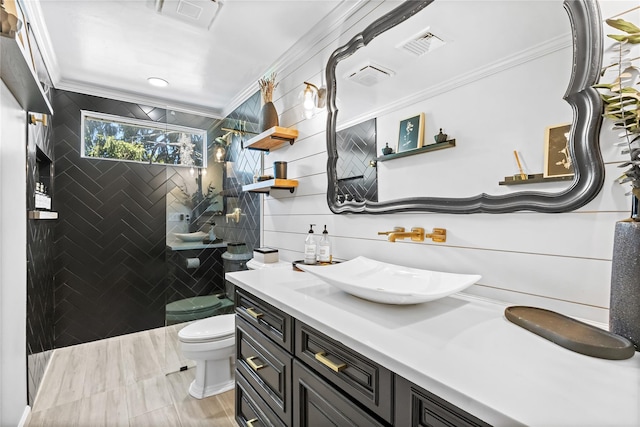 2307 Hawthorne Dr, Yorktown Heights, NY 10598 - bathroom featuring crown molding, toilet, vanity, a walk in shower, and tile walls