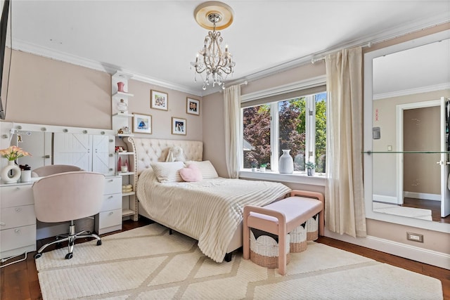 2307 Hawthorne Dr, Yorktown Heights, NY 10598 - bedroom with ornamental molding, wood finished floors, a chandelier, and baseboards