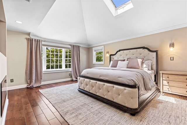 2307 Hawthorne Dr, Yorktown Heights, NY 10598 - bedroom with a skylight, baseboards, wood finished floors, vaulted ceiling, and crown molding